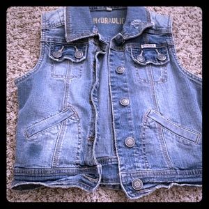 Sleeveless distressed jean jacket